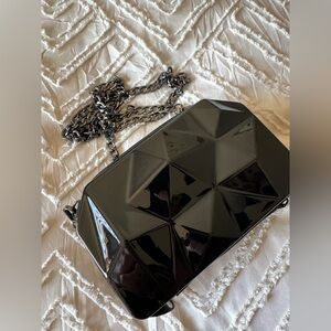 Hardshell clutch with chain